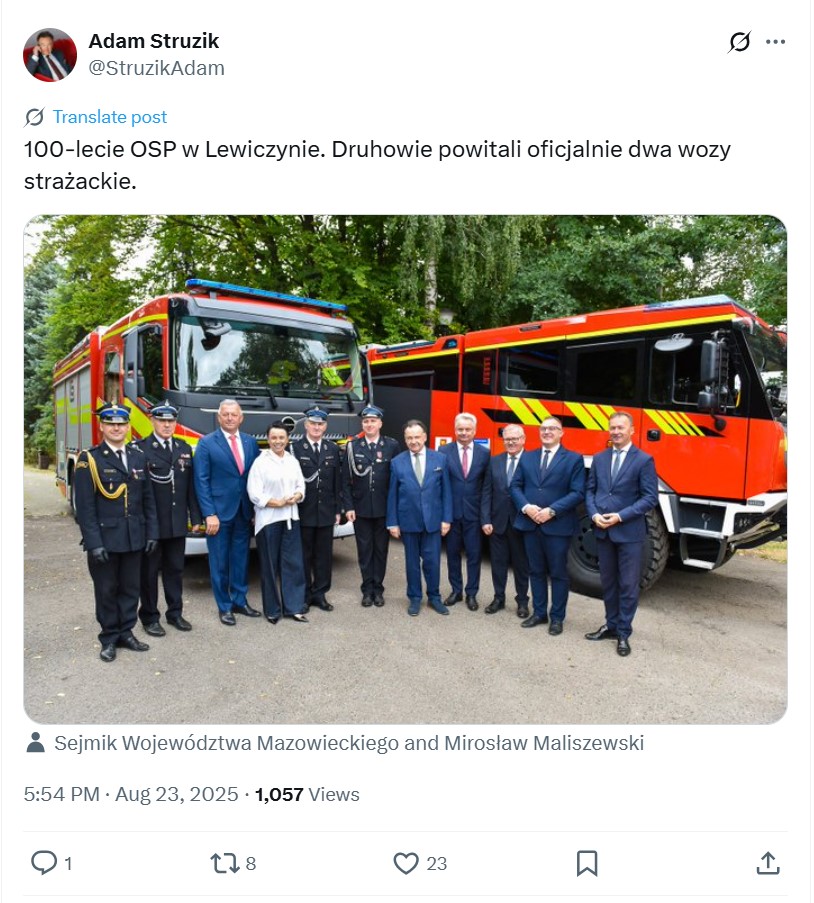 Post marszałka Struzika ze zdjęciem na tle wozów strażackich